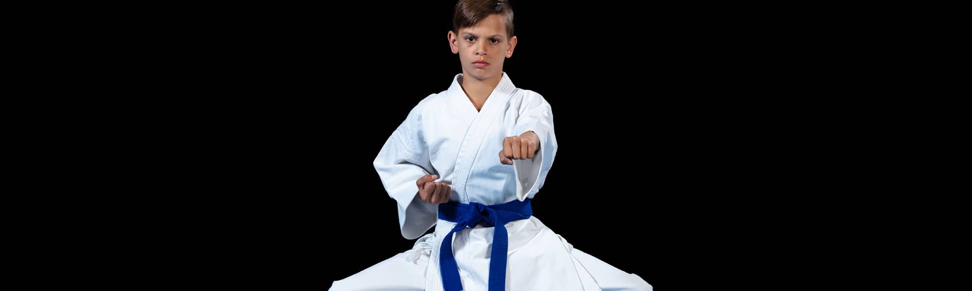 Young boy training Karate in Rhyl